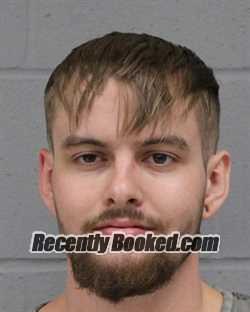 Booking photo from Travis County, Texas