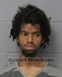 Booking photo from Travis County, Texas