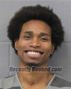 Booking photo from Travis County, Texas