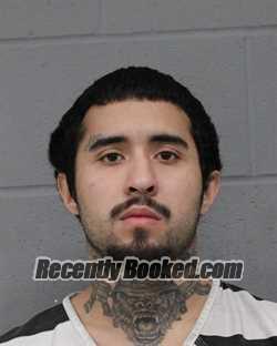 Booking photo from Travis County, Texas