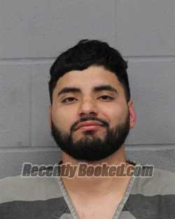Booking photo from Travis County, Texas