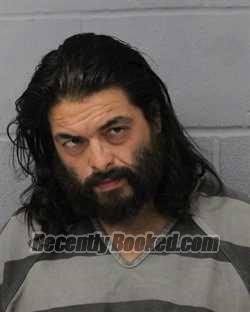 Booking photo from Travis County, Texas