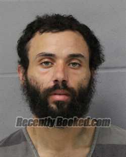 Booking photo from Travis County, Texas