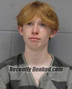Booking photo from Travis County, Texas