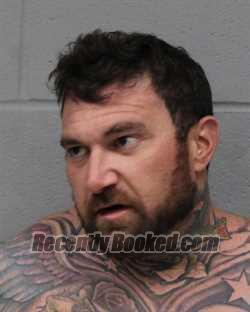 Booking photo from Travis County, Texas