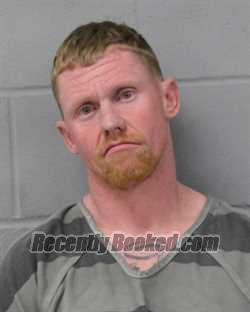 Booking photo from Travis County, Texas