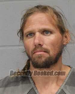 Booking photo from Travis County, Texas