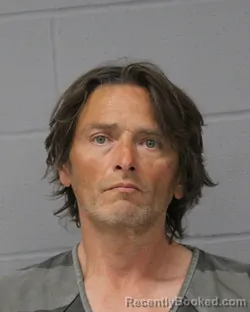 Booking photo from Travis County, Texas