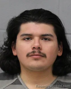 Booking photo from Travis County, Texas