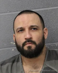 Booking photo from Travis County, Texas