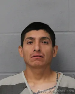 Booking photo from Travis County, Texas