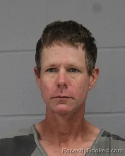 Booking photo from Travis County, Texas
