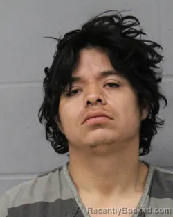 Booking photo from Travis County, Texas