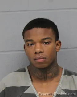 Booking photo from Travis County, Texas