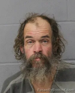 Booking photo from Travis County, Texas