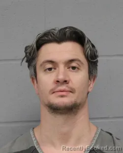 Booking photo from Travis County, Texas