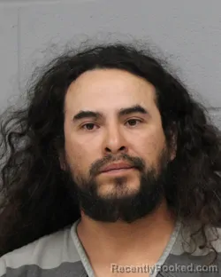 Booking photo from Travis County, Texas