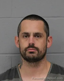 Mugshot of JOHN STURGIS booked in Travis County, Texas on March 24, 2026