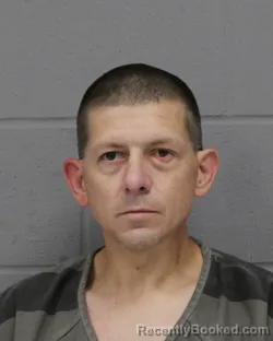 Mugshot of DAVID BERLIN booked in Travis County, Texas on March 24, 2026