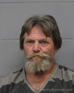 Mugshot of DAVID LORE booked in Travis County, Texas on March 24, 2026