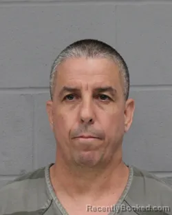 Mugshot of EM ARTIAGAS GARCIA booked in Travis County, Texas on March 24, 2026