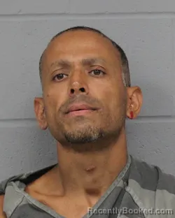 Mugshot of HAMIDJAN MOMAND booked in Travis County, Texas on March 24, 2026