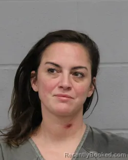 Mugshot of ELIZABETH ALPER booked in Travis County, Texas on March 24, 2026