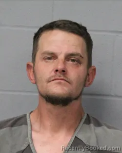 Mugshot of JACK HINDS booked in Travis County, Texas on March 27, 2026