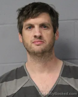 Mugshot of CHRISTOPHER HARKINS booked in Travis County, Texas on March 31, 2026