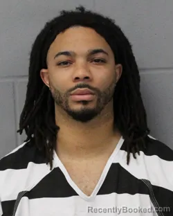 Mugshot of JAYLEN SMITH booked in Travis County, Texas on April 24, 2026