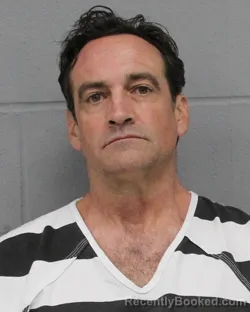 Mugshot of JOSEPH RENTZ booked in Travis County, Texas on April 24, 2026