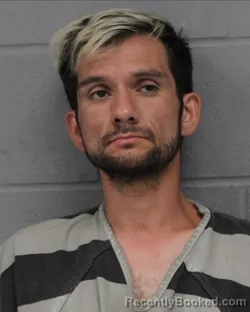 Mugshot of AARON LOYA booked in Travis County, Texas on June 11, 2026