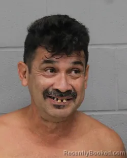 Mugshot of ARNULFO RIVAS booked in Travis County, Texas on June 11, 2026