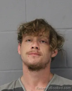 Mugshot of AUSTIN COOMBS booked in Travis County, Texas on June 12, 2026