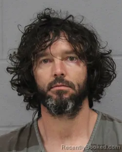 Mugshot of JUSTIN USSERY booked in Travis County, Texas on June 16, 2026