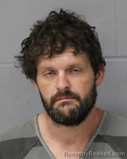 Mugshot of TYLER MOORE booked in Travis County, Texas on June 17, 2026