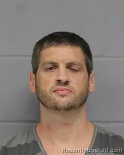 Mugshot of CHRISTOPHER HARKINS booked in Travis County, Texas on June 17, 2026