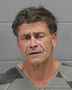Mugshot of THOMAS CARROL booked in Travis County, Texas on June 17, 2026