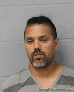 Mugshot of JUAN ACUNA booked in Travis County, Texas on June 17, 2026