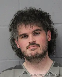 Mugshot of TREVOR RUSSELL booked in Travis County, Texas on June 18, 2026