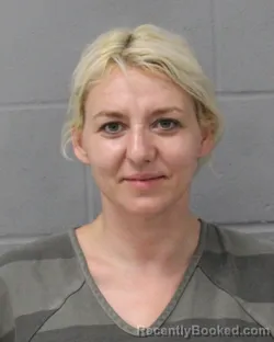 Mugshot of ASHLEY RUCKER booked in Travis County, Texas on June 21, 2026