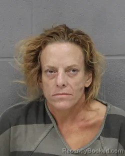 Mugshot of CATHERINE LEPS booked in Travis County, Texas on June 23, 2026