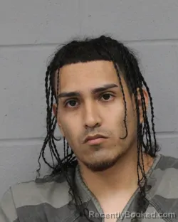 Mugshot of OSVALDO GARZA booked in Travis County, Texas on June 23, 2026