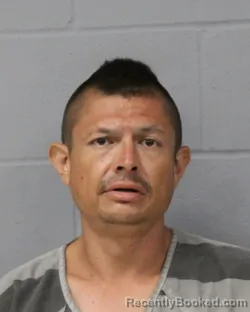 Mugshot of JUAN RIOJAS booked in Travis County, Texas on June 23, 2026