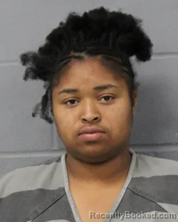 Mugshot of KENNADI SCOTT booked in Travis County, Texas on June 24, 2026