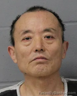 Mugshot of DACHENG LI booked in Travis County, Texas on June 24, 2026