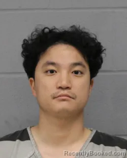 Mugshot of JINHYEOK HONG booked in Travis County, Texas on June 24, 2026