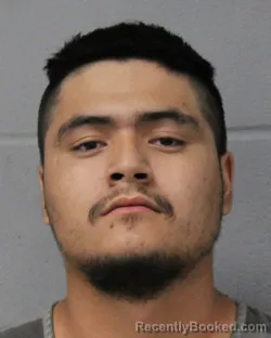 Mugshot of JP ALEMAN booked in Travis County, Texas on June 27, 2026