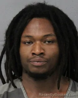 Mugshot of CAMERON KODUA booked in Travis County, Texas on June 27, 2026