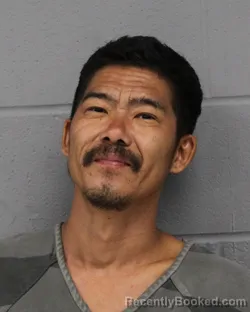 Mugshot of TENZIN NORYANG booked in Travis County, Texas on June 29, 2026